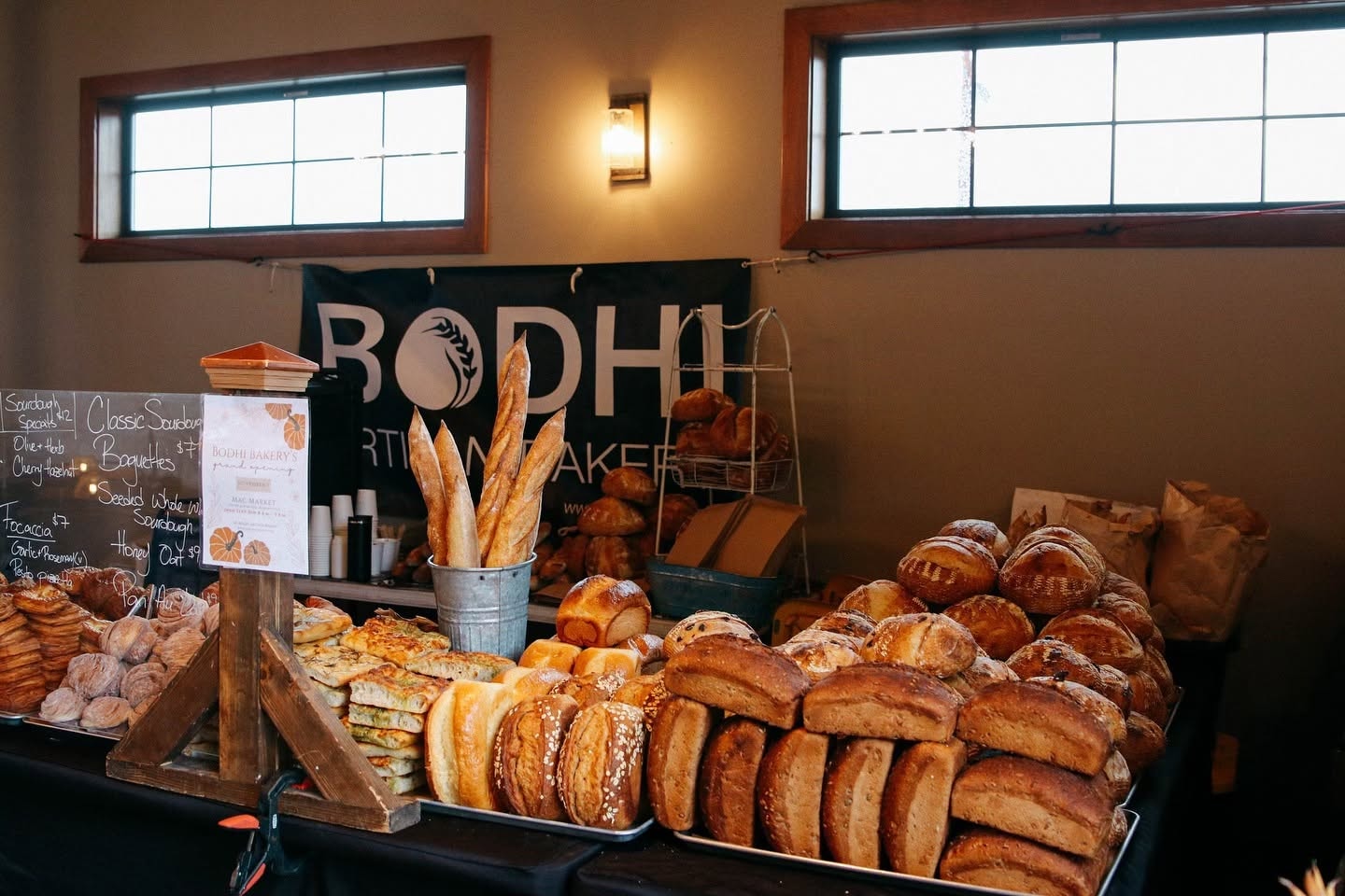 Bodhi farmers market booth with fresh bread and community