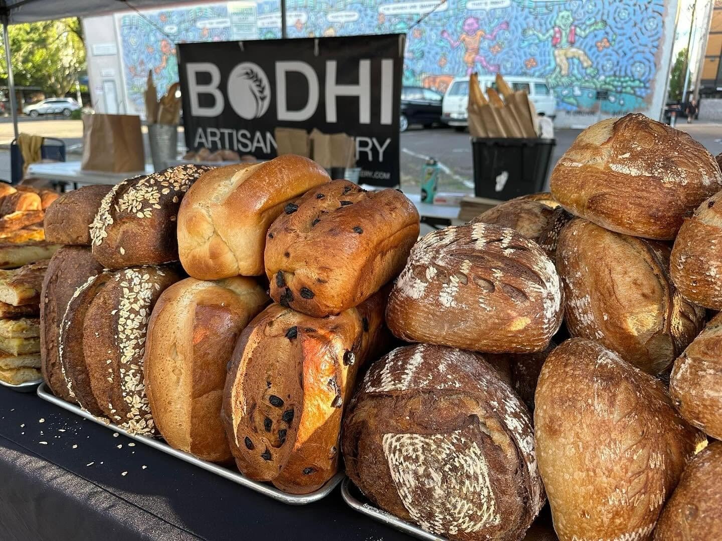 Artisan bread loaves on display at the farmers market